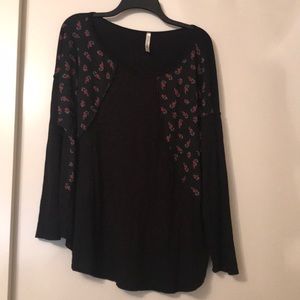 Black top with floral detail